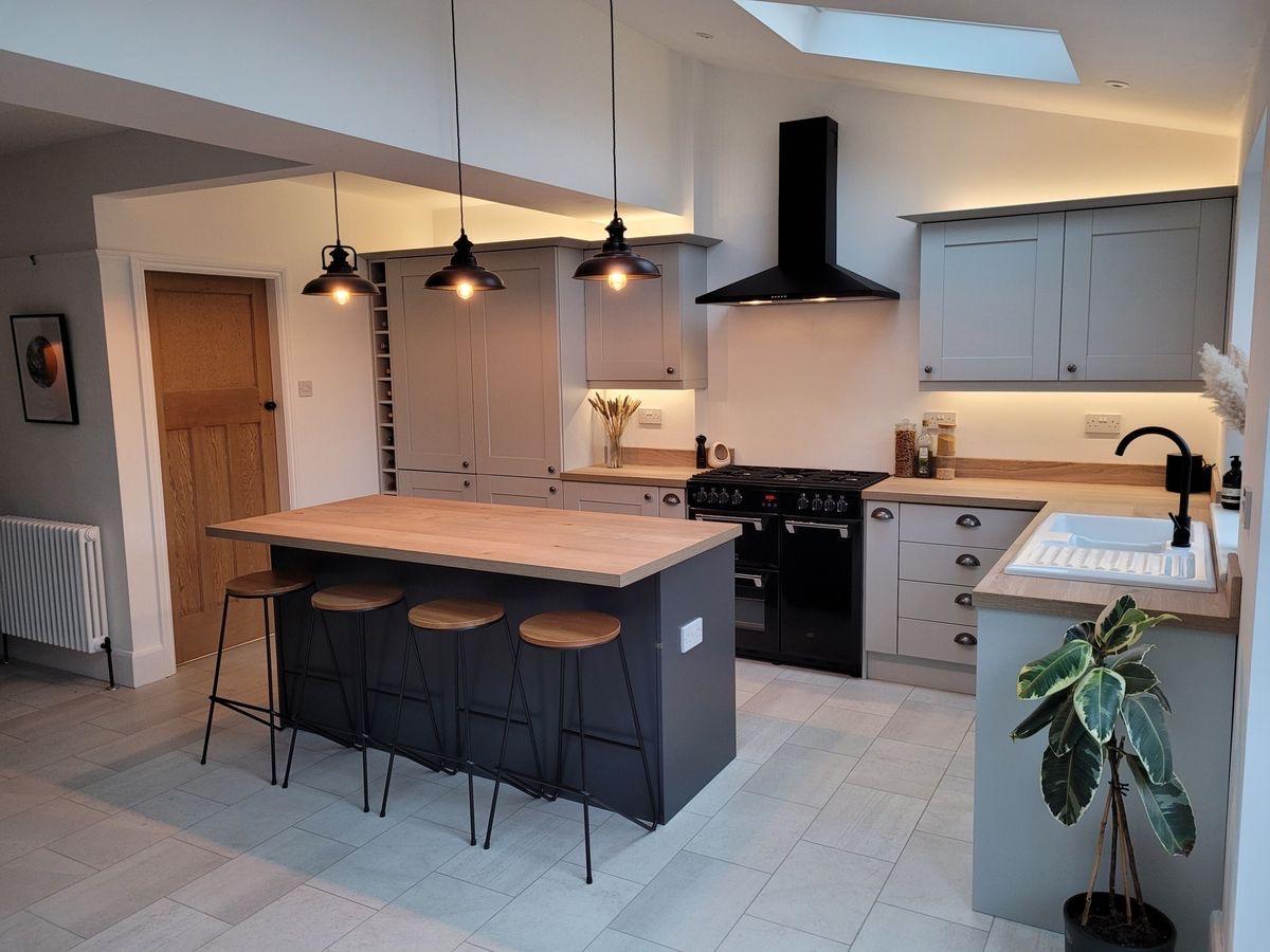 Open plan shaker kitchen with vaulted ceiling and roof light in Morpeth