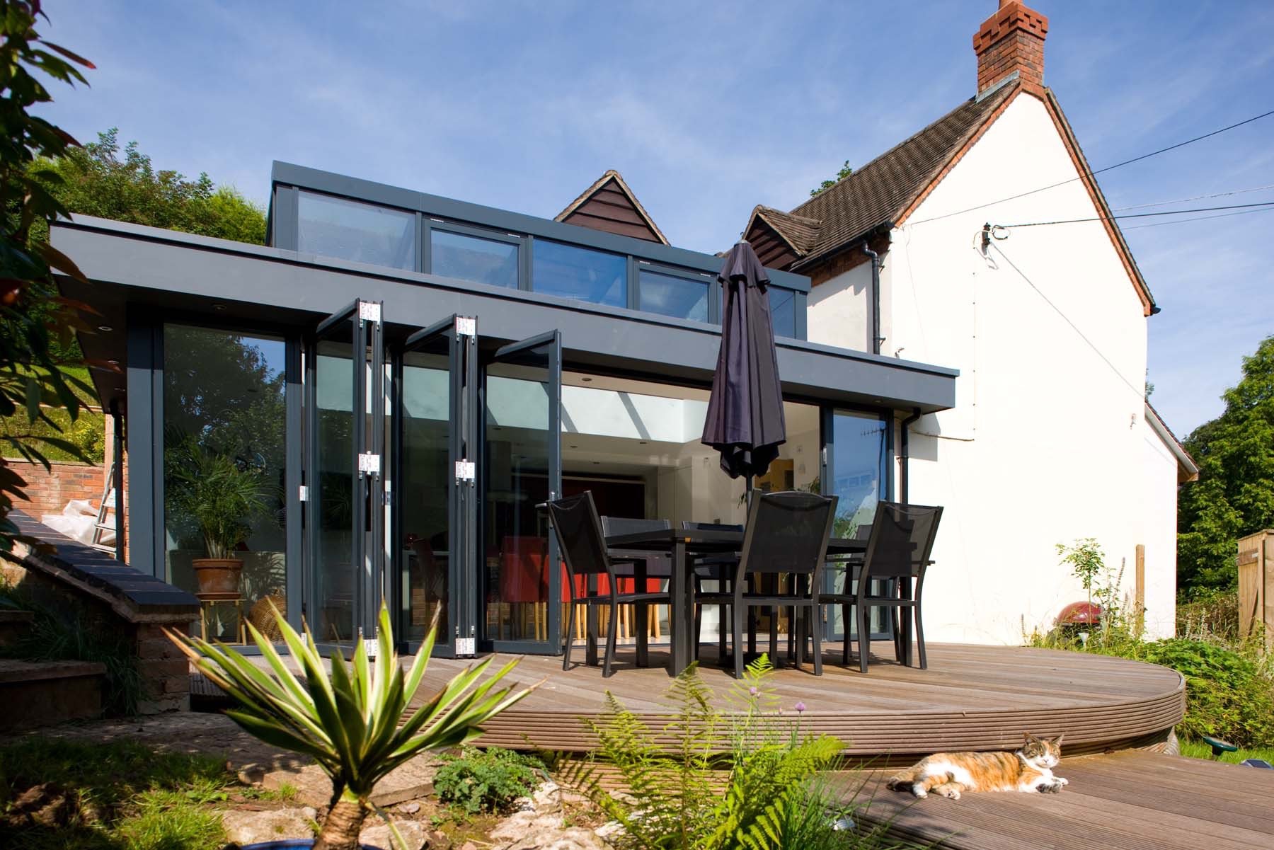 Rear view of the Alnwick extension with raised deck and garden