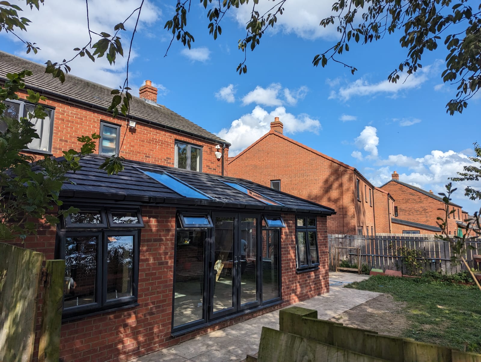 Garden view of the finished Seaburn extension with French doors opening onto the patio