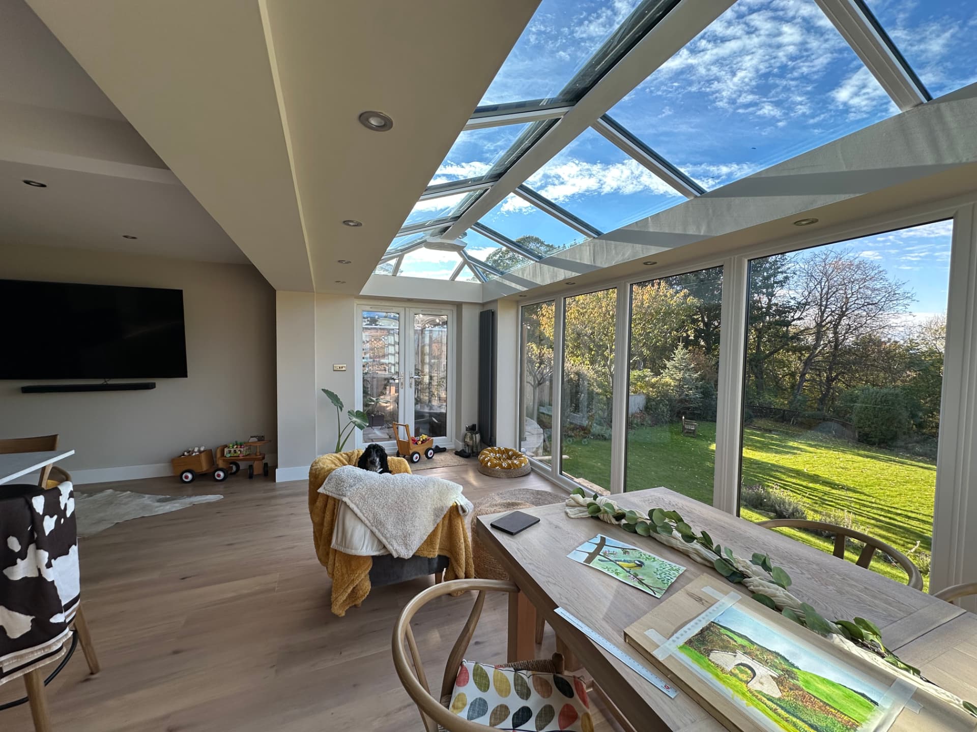 Family living area under the lantern roof with garden outlook