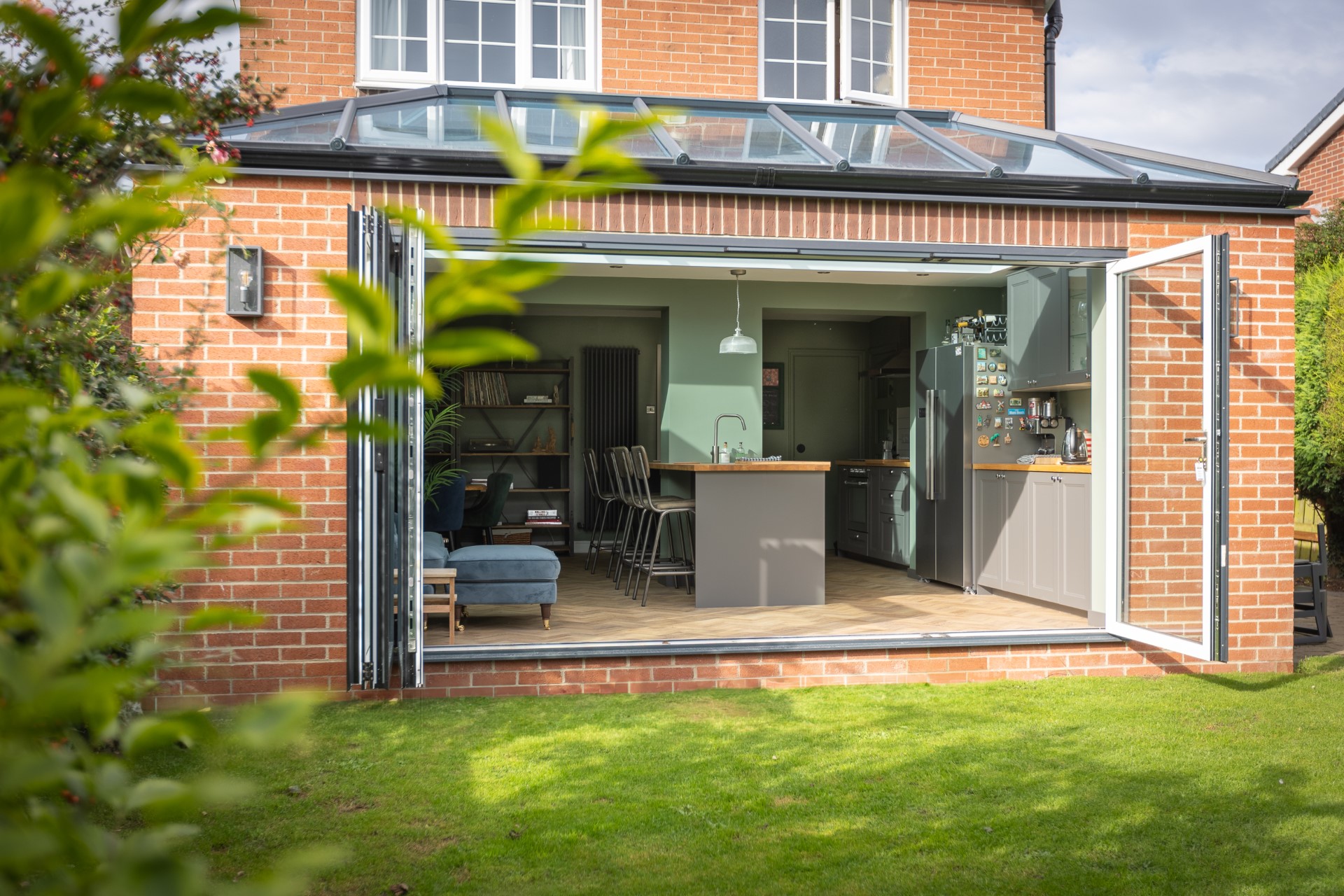 Rear kitchen extension in Sunderland with glazed lantern roof and open bi-fold doors onto the garden