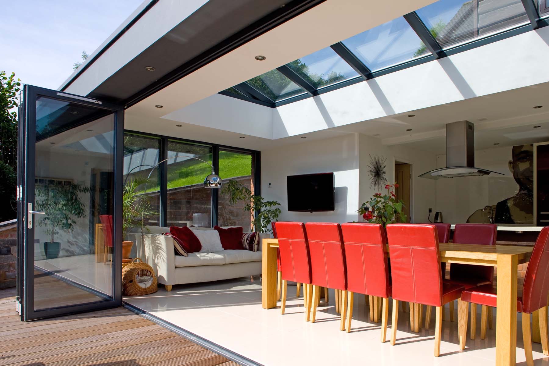 Open-plan kitchen-diner interior with roof lanterns and bifold doors, Alnwick