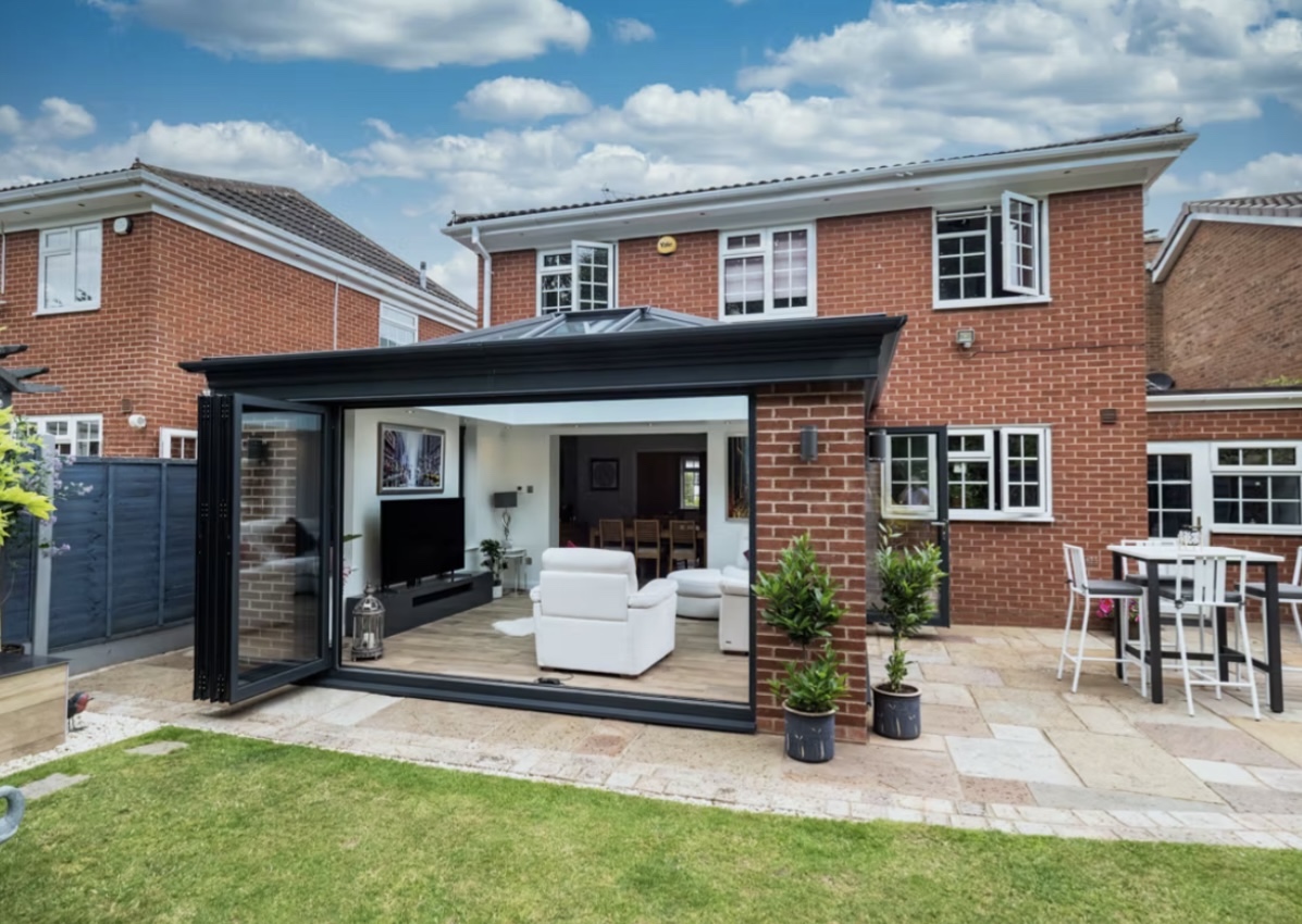 Garden elevation of the Whitley Bay orangery with bi-fold doors open