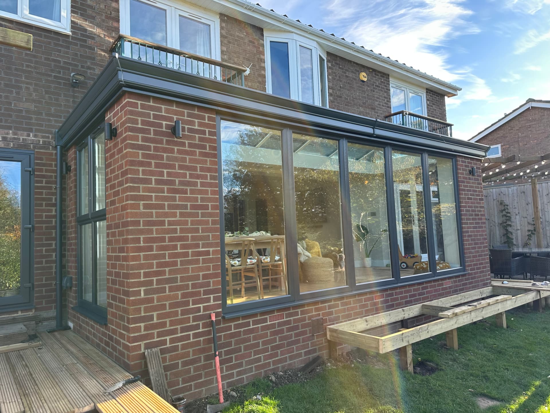 Brick and anthracite aluminium rear extension with glazed lantern roof in Yarm