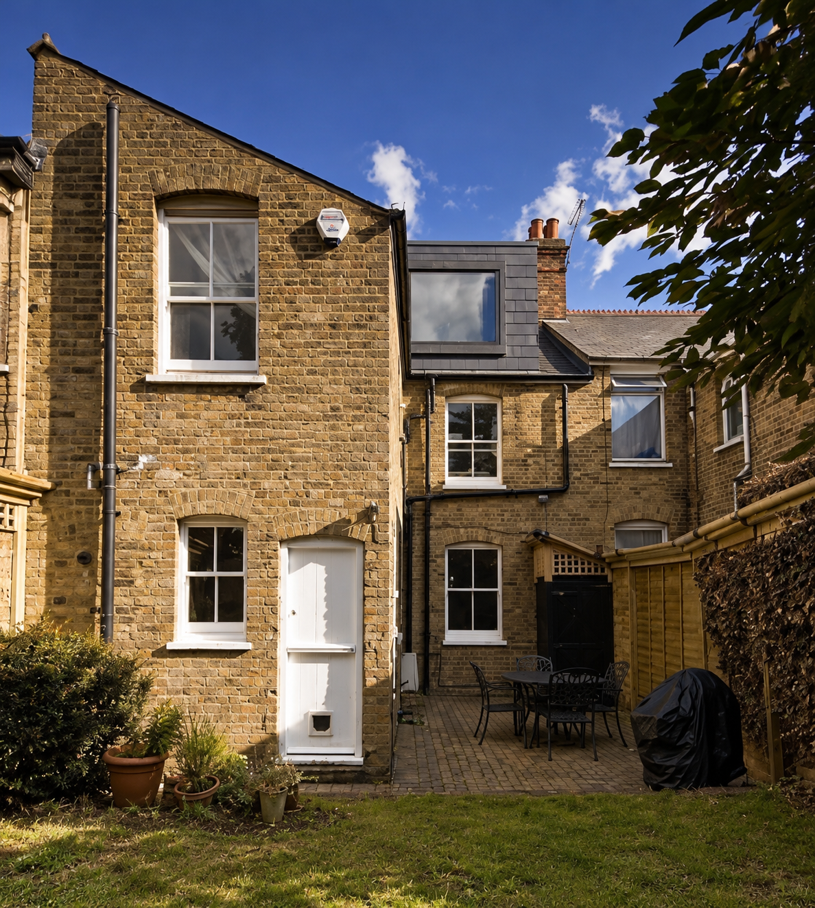 Original brick rear elevation of the Jesmond home before the extension