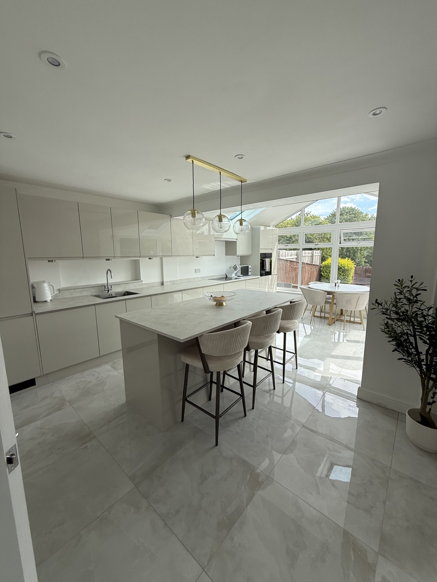 Open-plan kitchen and dining space created by a conservatory conversion in Stanhope