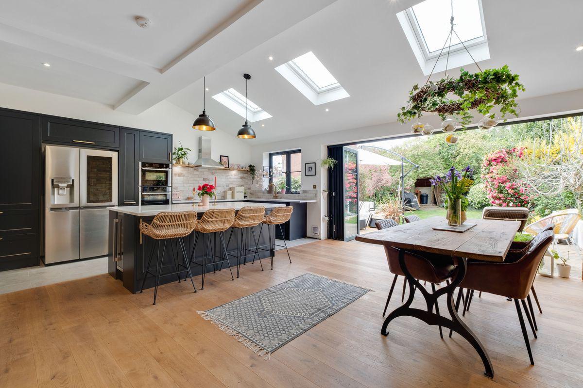Charcoal shaker kitchen extension with vaulted ceiling, roof lights and bifold doors in Corbridge