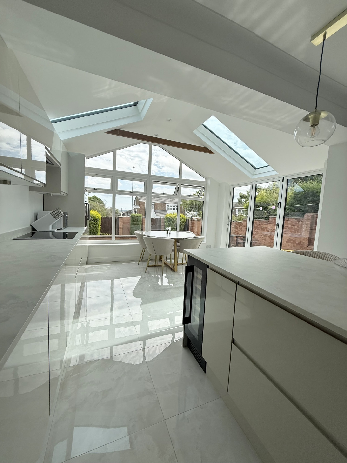 Converted conservatory in Stanhope with insulated warm roof, roof lights and gable window over a dining area