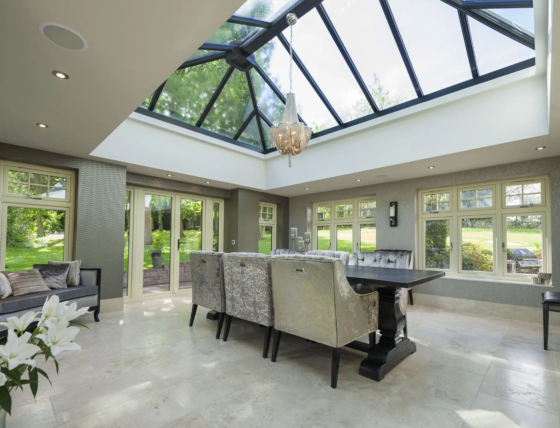 Dining area opening to the garden through full-height French doors, Stanhope